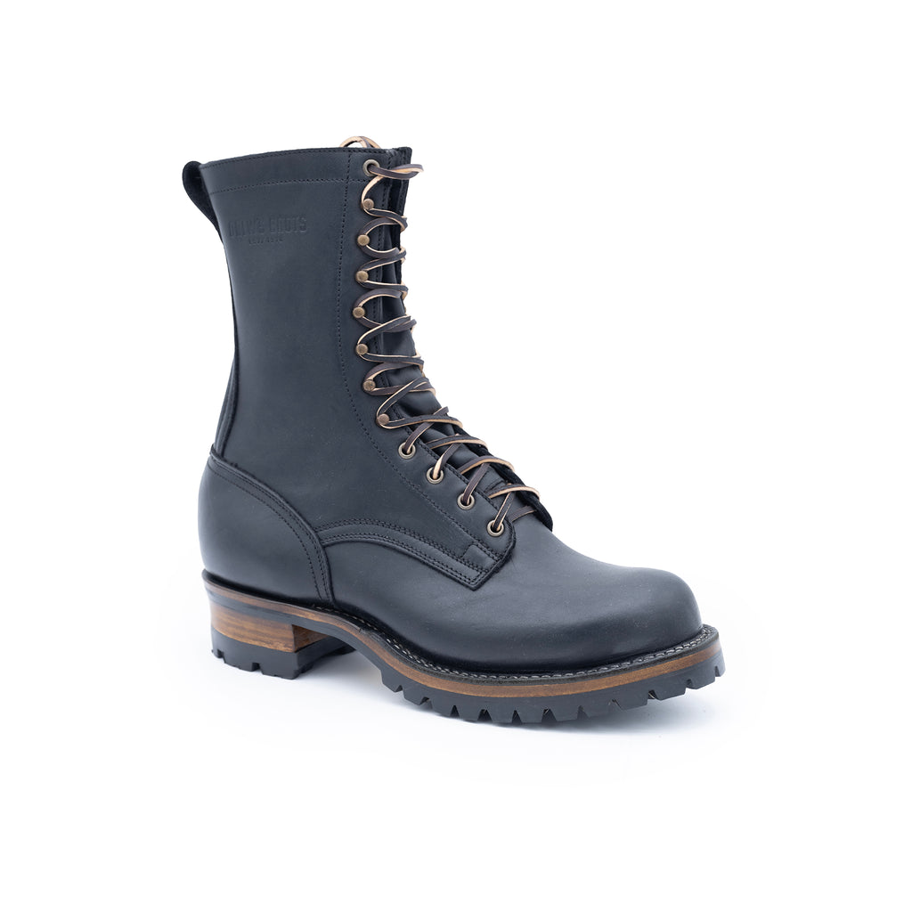 Black boot with laces on a white background