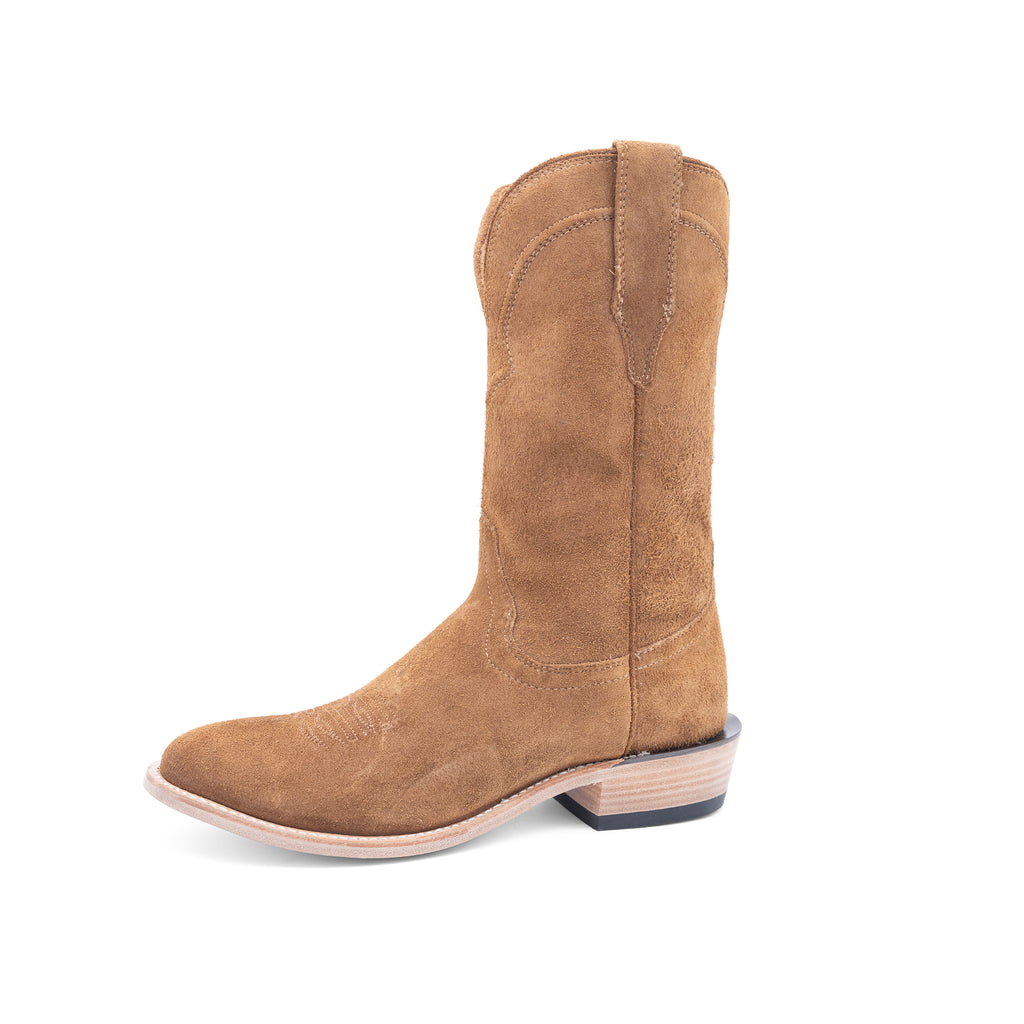 Brown suede cowboy boot on a white background