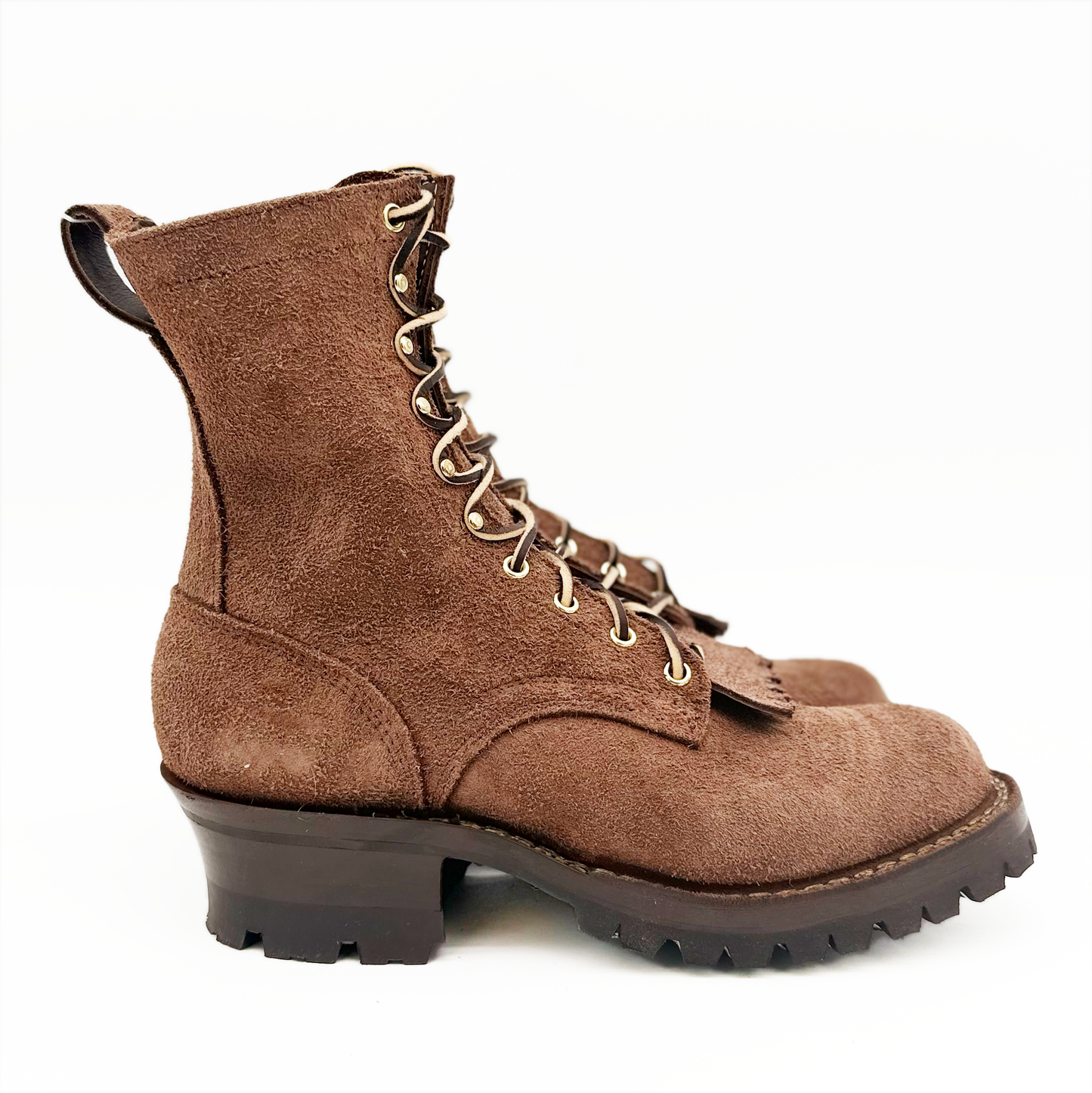 Brown suede boot with lace-up design on a white background