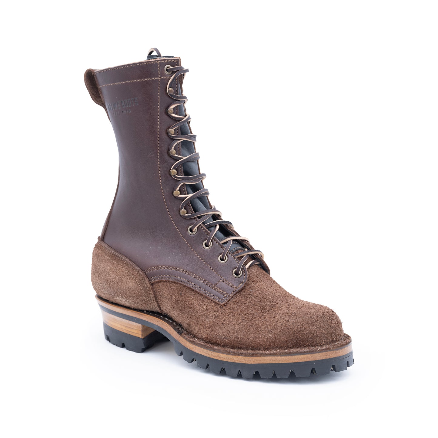 Brown leather boot with a rugged sole on a white background