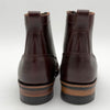 Pair of brown leather boots on a white background