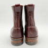 Pair of brown leather boots on a white background