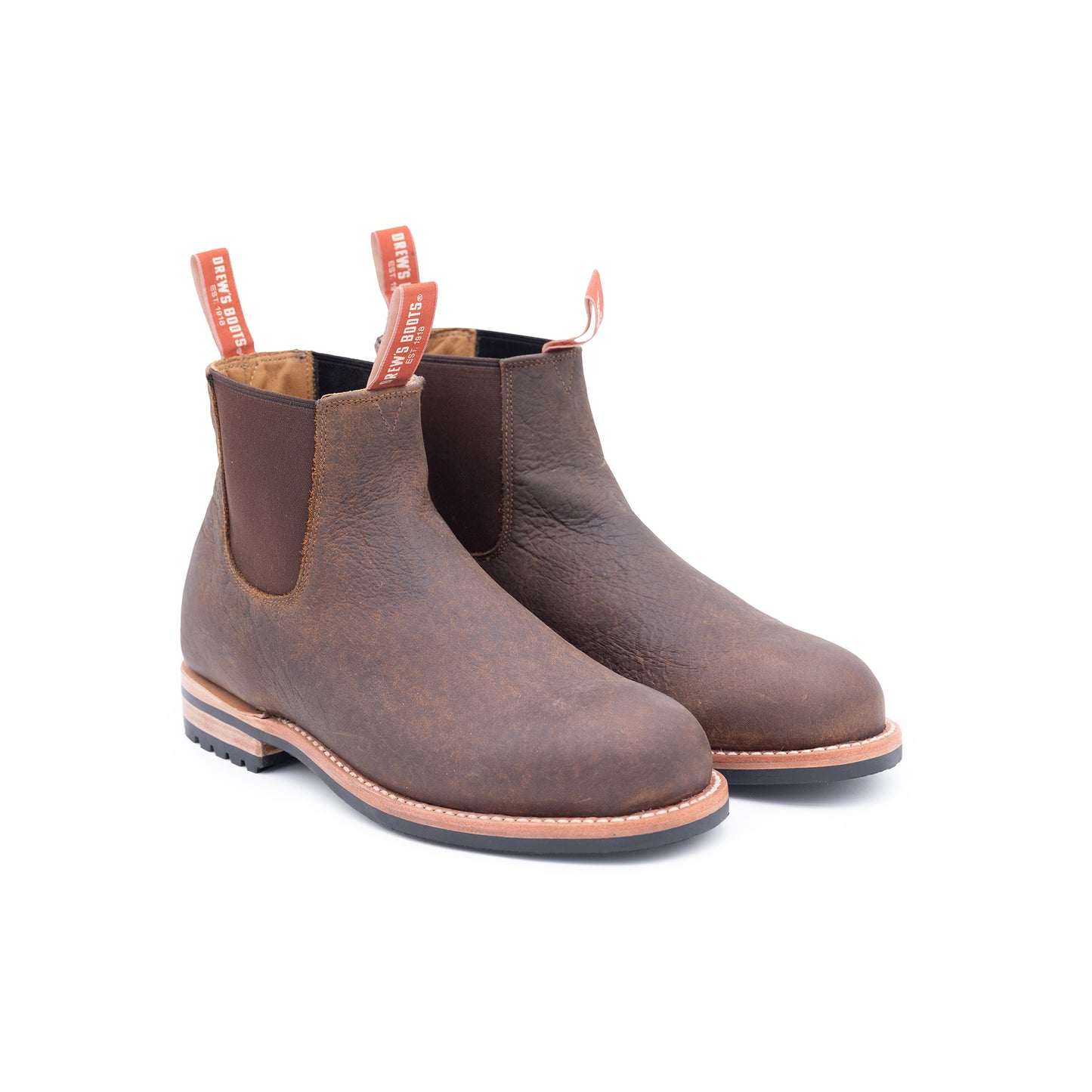 Pair of brown leather boots with visible brand name on a white background