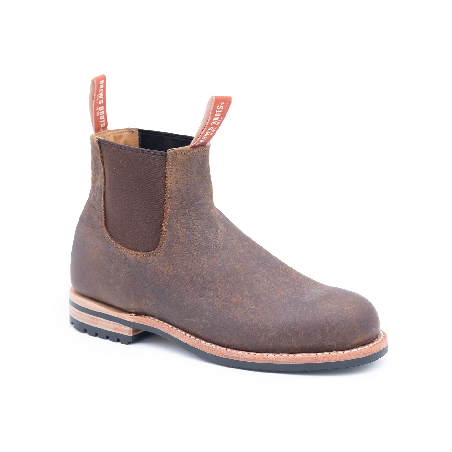 Brown Chelsea boot with a white background