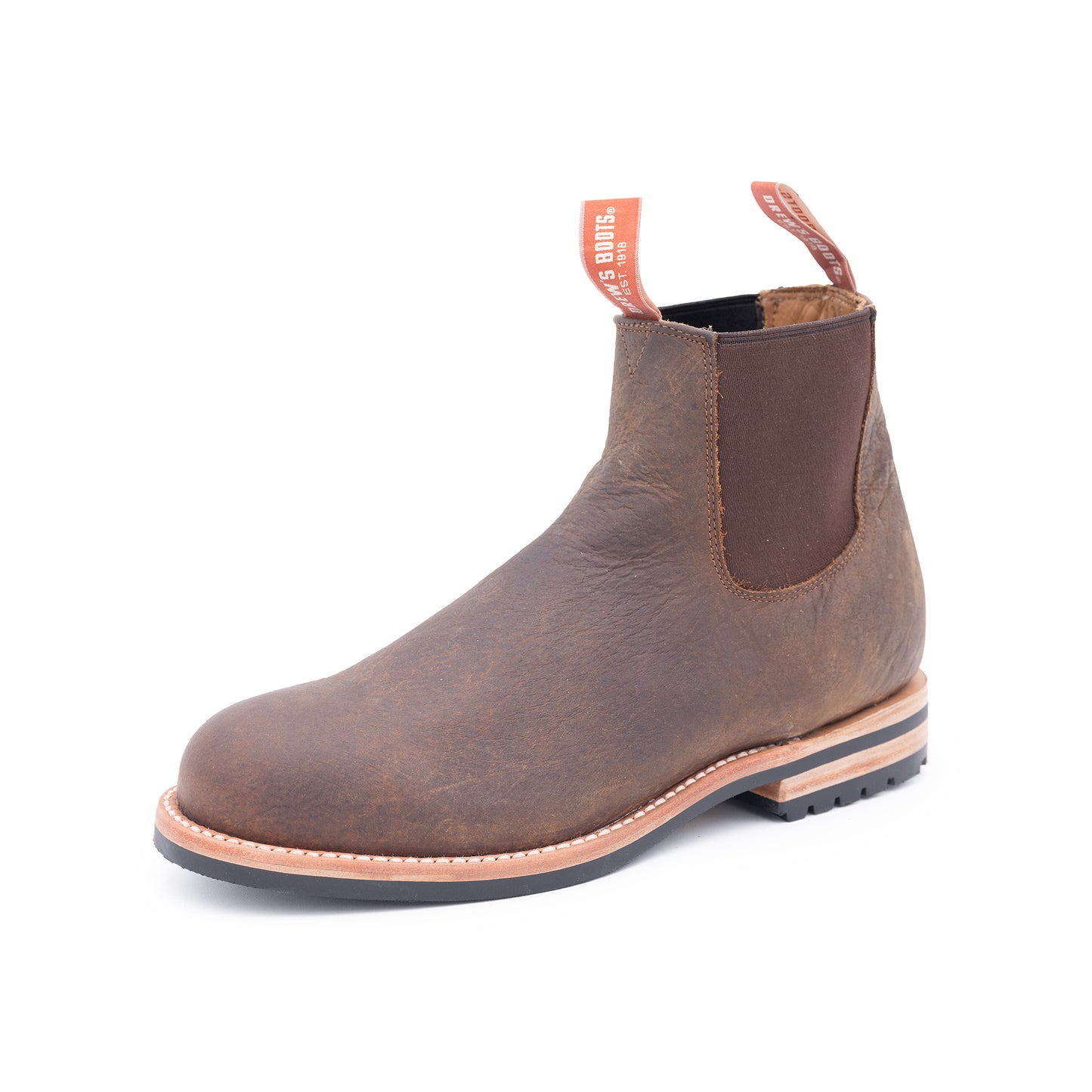 Brown leather Chelsea boot on a white background